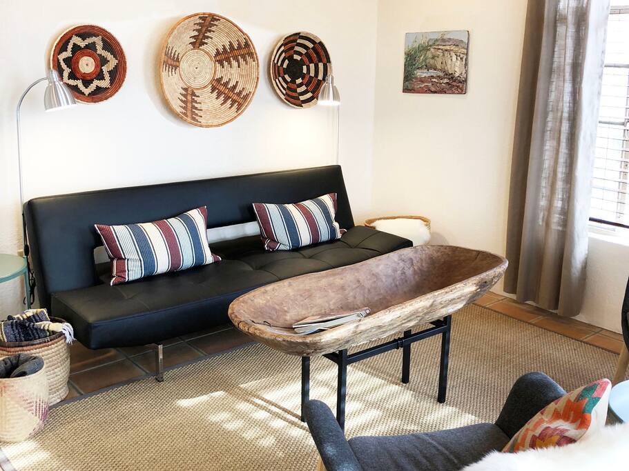The living room has a click-clack type sofa that folds down into a full-sized bed.