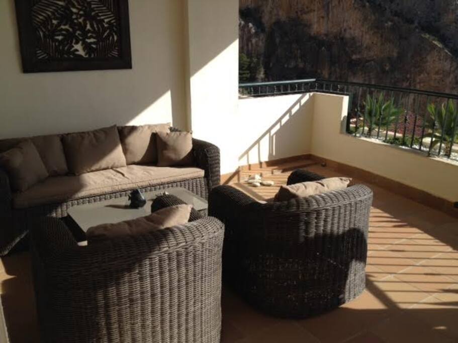 Relax on the sofa with the sea views.