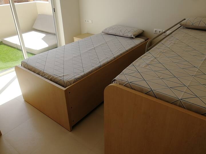 Bedroom with practical bedding set. 
(2m long) 