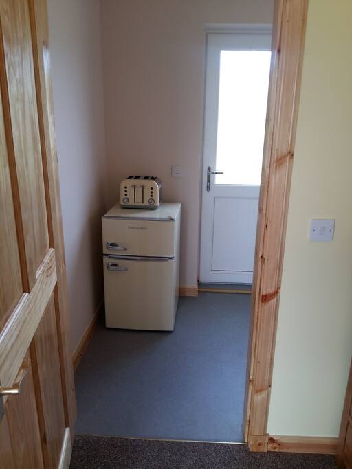 Entrance hall with fridge freezer