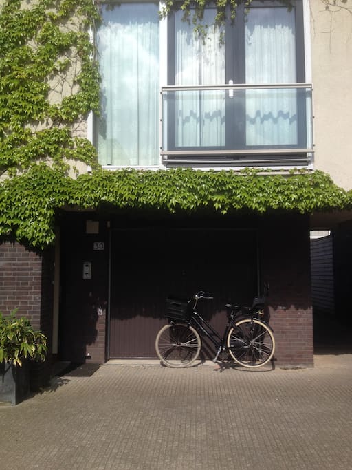 House on the outside - garage door / front door