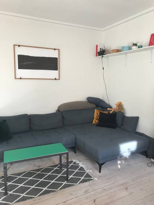 Our wonderful sofa corner. This sofa can fit 6 people easily and is perfect for a cosy movie night where there is room for the whole bunch.