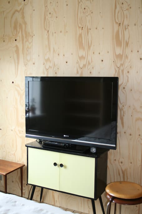 Tv in the sleeping room has several ways and plugs to connect to laptops to stream a good movie