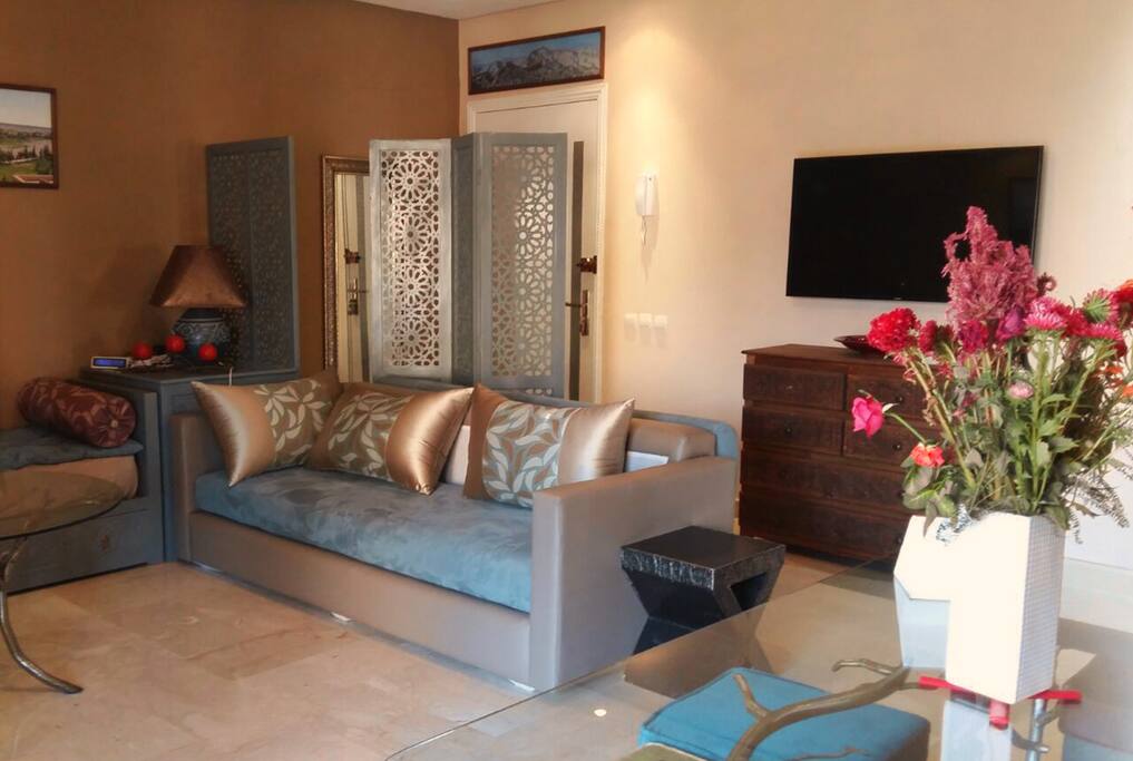The living room and its comfortable sofas. They are perfect for reading a book, chatting around a good freshly brewed mint tea and will make excisite beds.