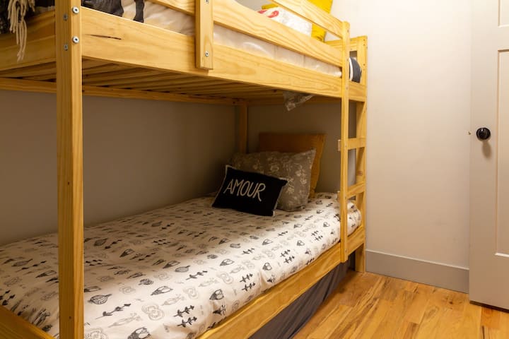 The second bedroom has bunkbeds and a trundle. 