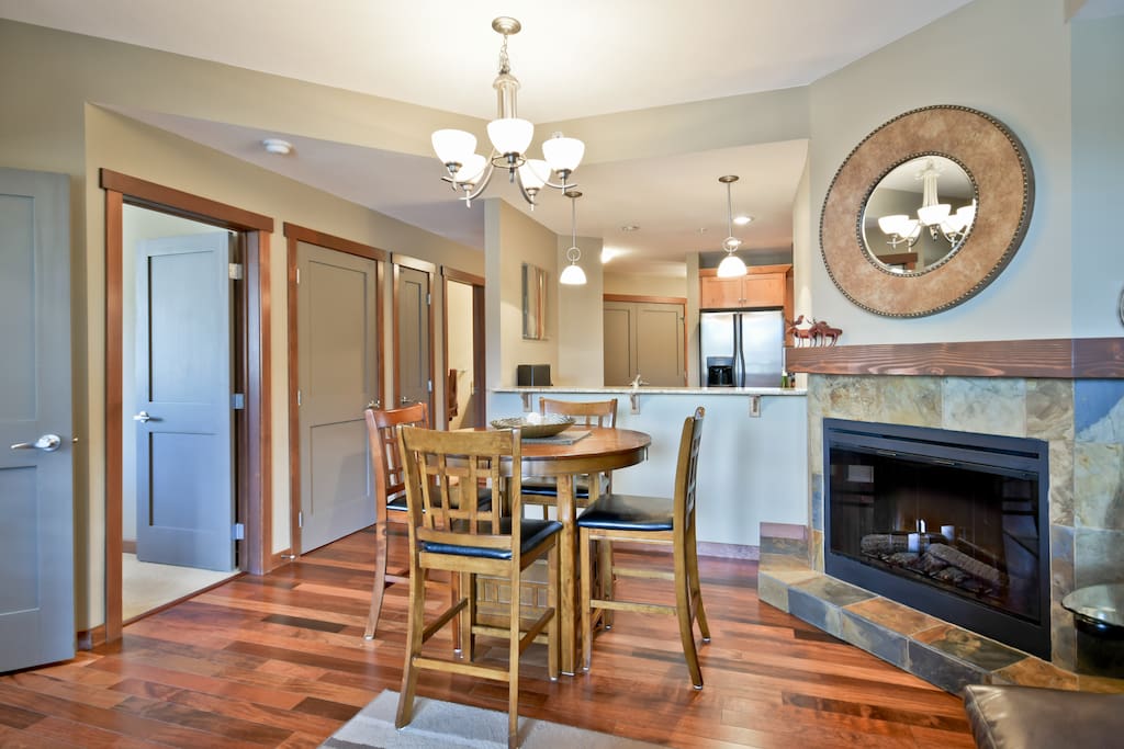 Beautiful hardwood flooring and trim, cozy fireplace too