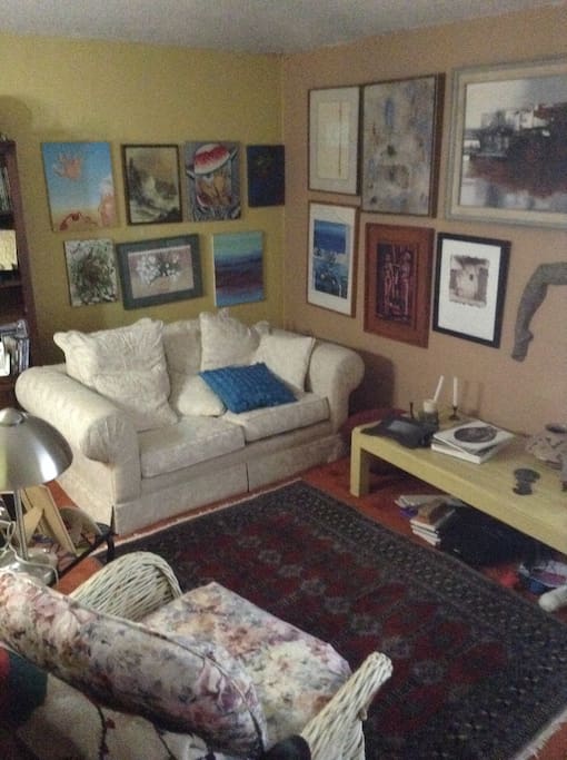 The living room art brings a touch from around the world.