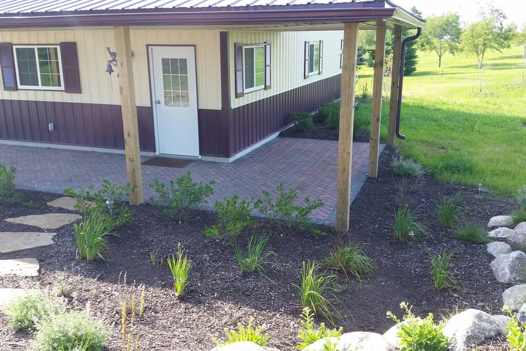 private entrance with covered patios