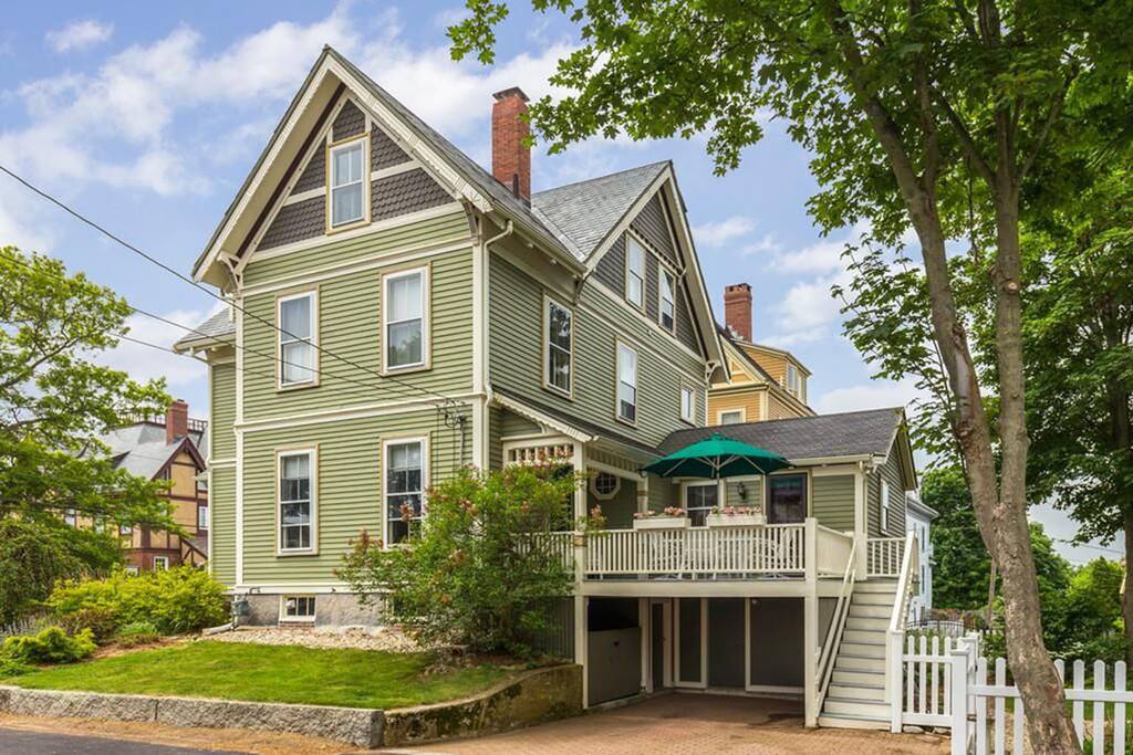 Welcome Home-Deck and driveway parking with carport.