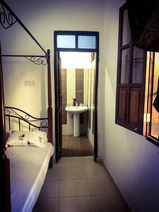 Double bed with private en-suite bathroom