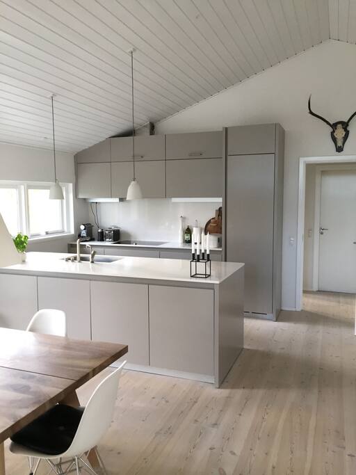 The kitchen with sink and hob.