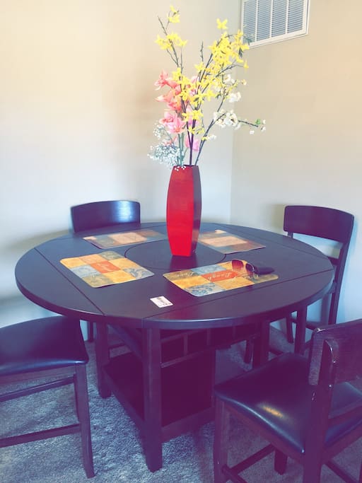 A four chaired dinning table