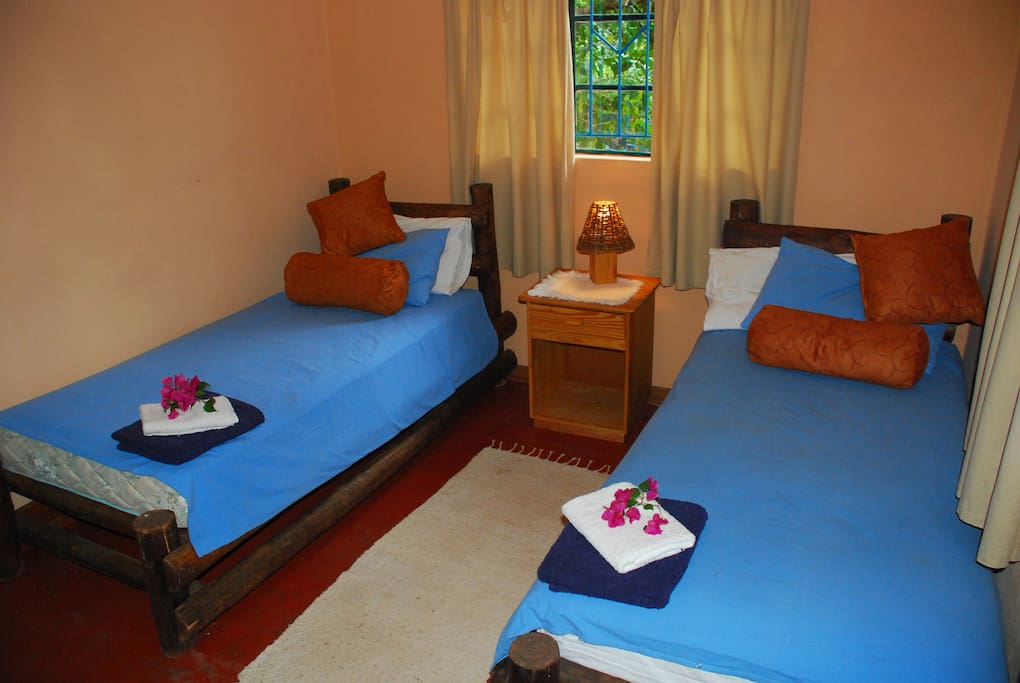 8 Twin Bed Rooms with fans & mozzie / security protection.