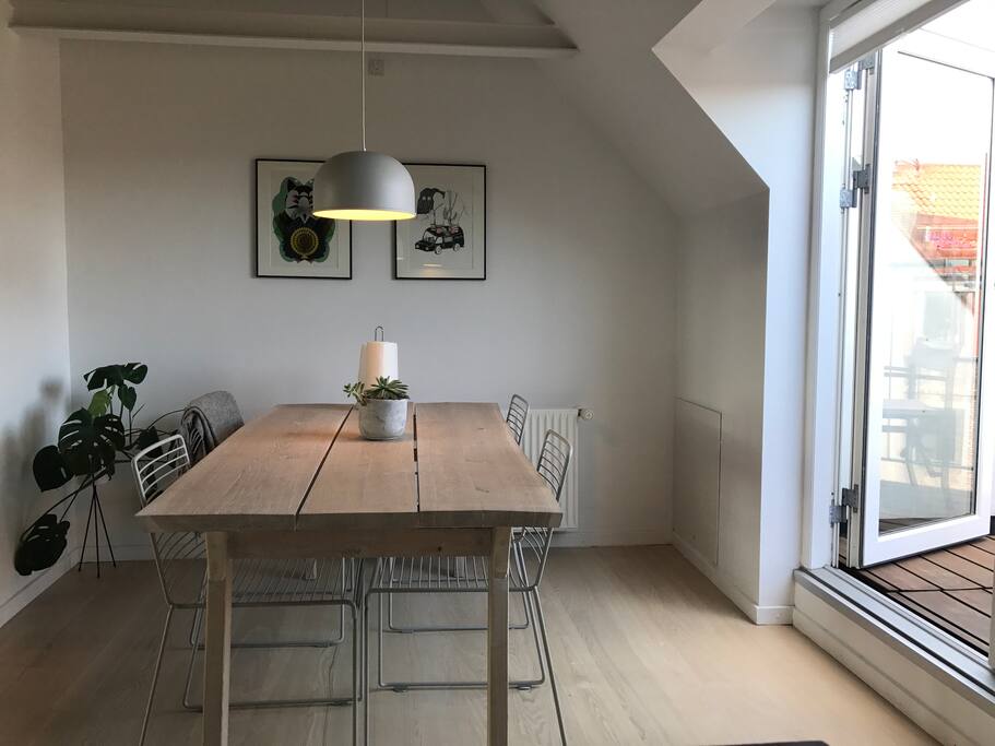 Dining area with exit to the balcony.