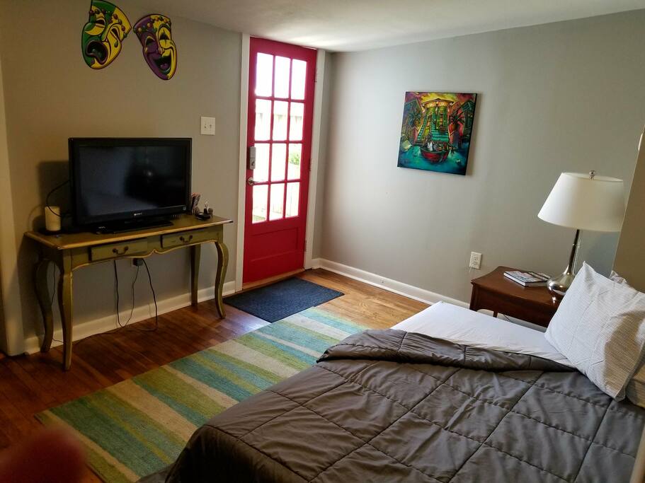 Living room with futon set up for extra guests.