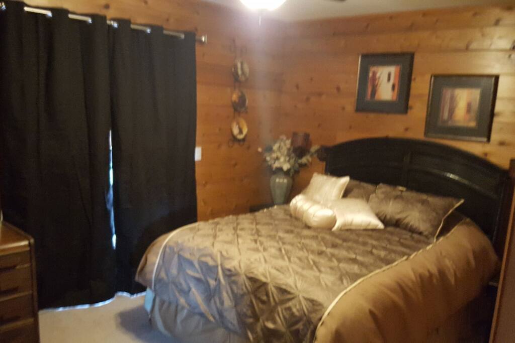 Added darkening thermo drapes, new bedding, desk to work from, etc.