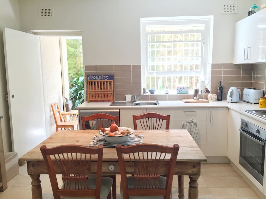 Country style kitchen. Help yourself to TV and food available.