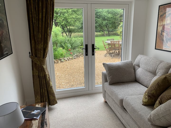 Snug with Sofa Bed and view to garden.