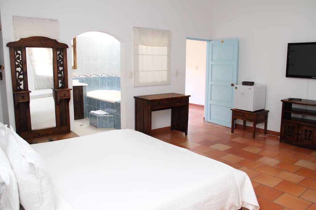 Habitación Deluxe con chimenea y jacuzzi