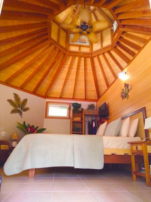 Elegant and fragrant tropical timber handcrafted interiors, deep comfort pillow-top queen bed