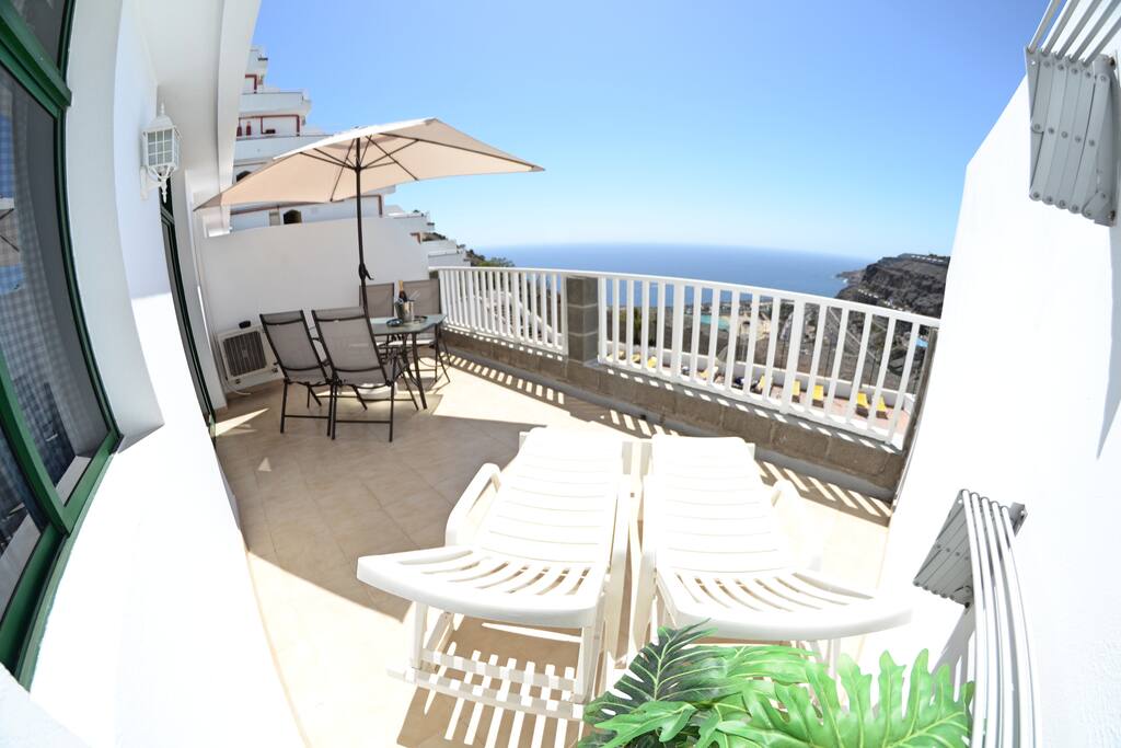 Spacious Private Taras with Dining Table for 4 Persons and Sunbeds