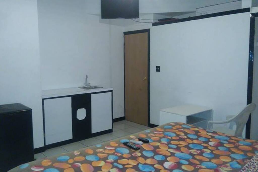 Enjoy the unique small kitchen in your room.