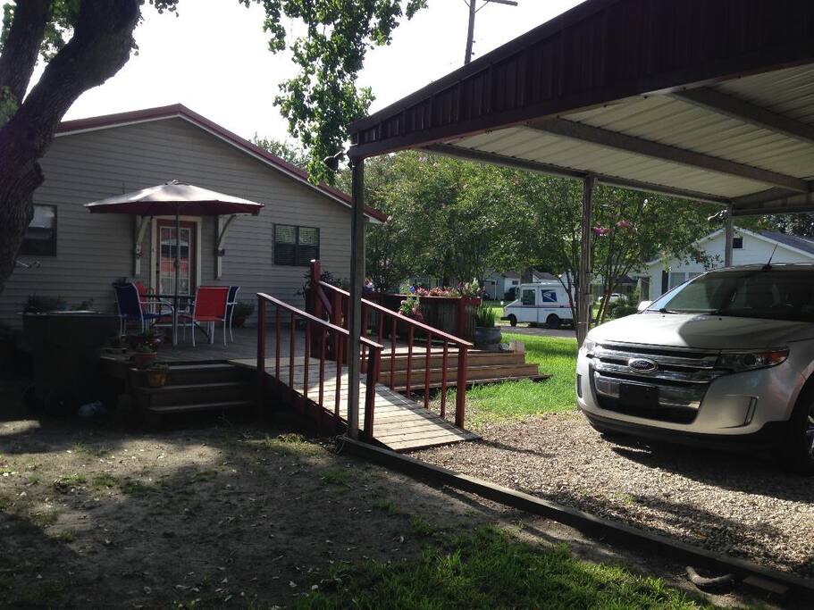 Back yard with covered parking