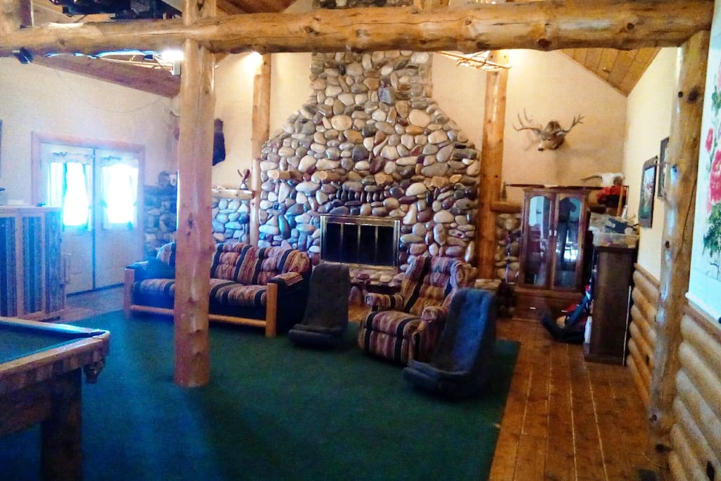 Great room for large gatherings. Includes pool table and home theater setup