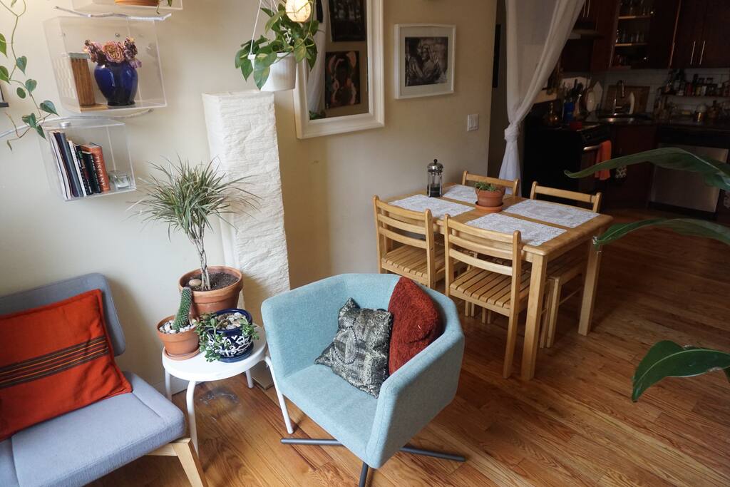Dining/Living Room. Great for enjoying a cup of coffee or reading a book near the window.