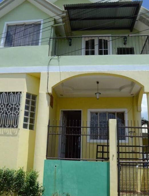 The main door shows the balcony on top which is connected to Bedroom 2