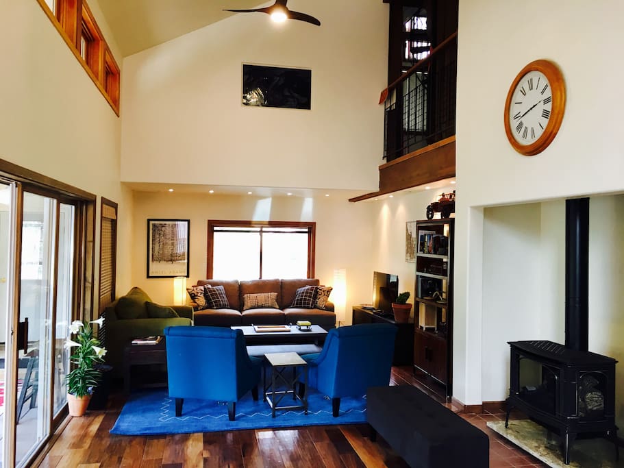 open style living area has brand new furniture, rug, and fireplace. Hand scraped cherrywood floors on both levels of the house.