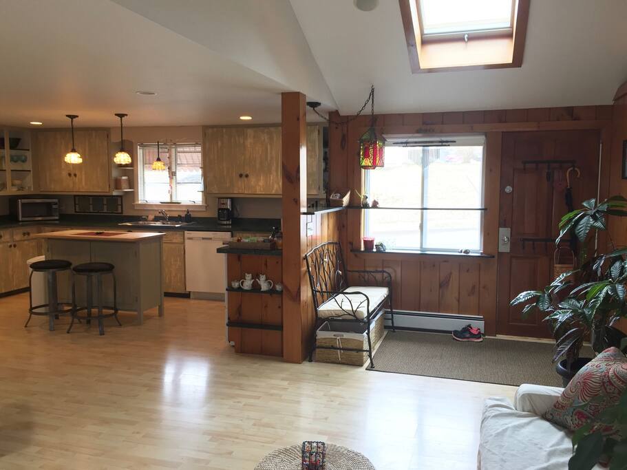 main entrance little bench to please take off your shoes open concept kitchen island