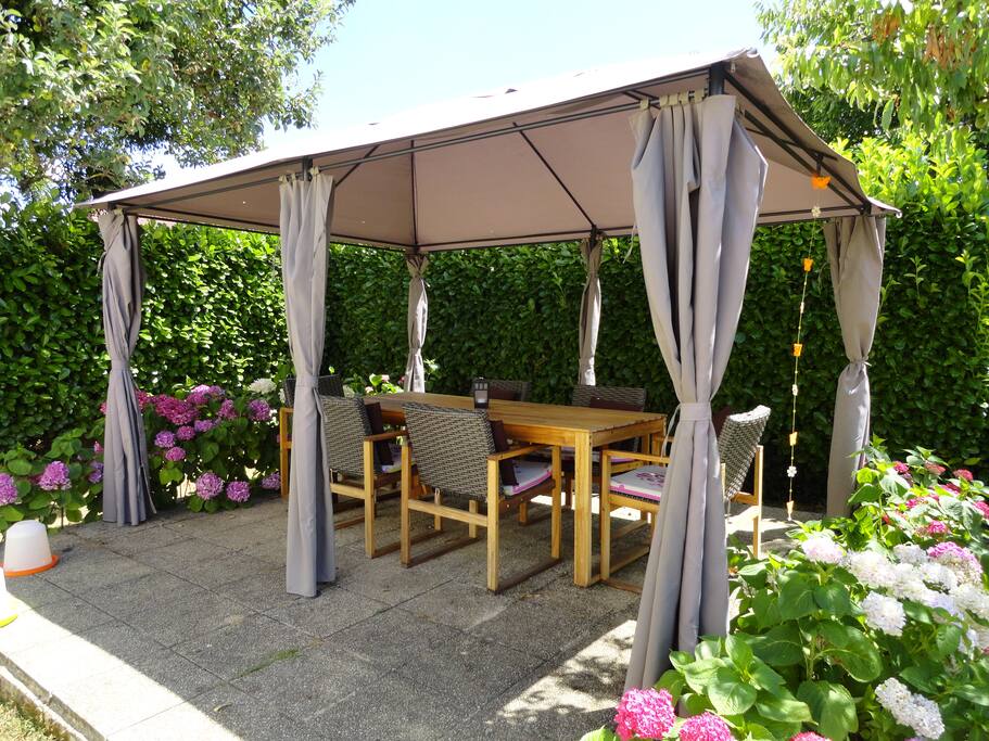 Outside eating area with BBQ