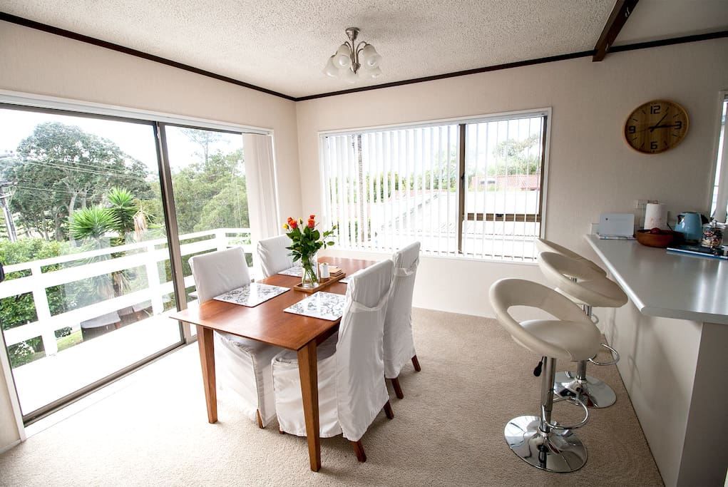 North facing dining opening to deck