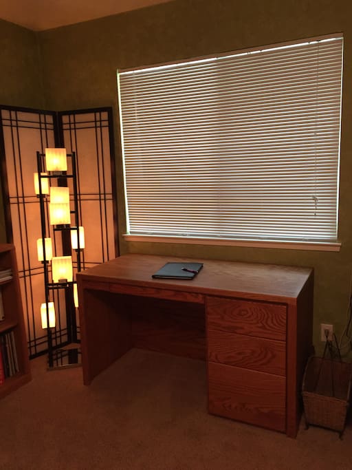 Desk with help yourself office supplies within.