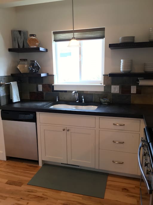 Fully equipped kitchen with new appliances.