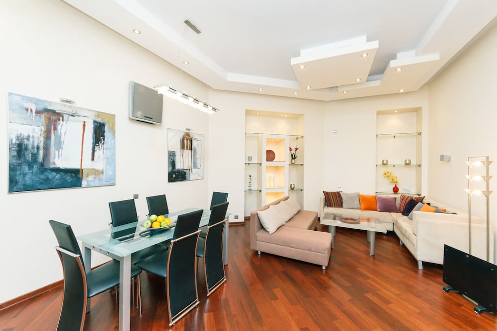 In the living room there are two comfortable sofas infront flat-screen TV. Also living room is fitted with elegant glass coffee table, conference table for 6 people and a comfortable table for the computer work.