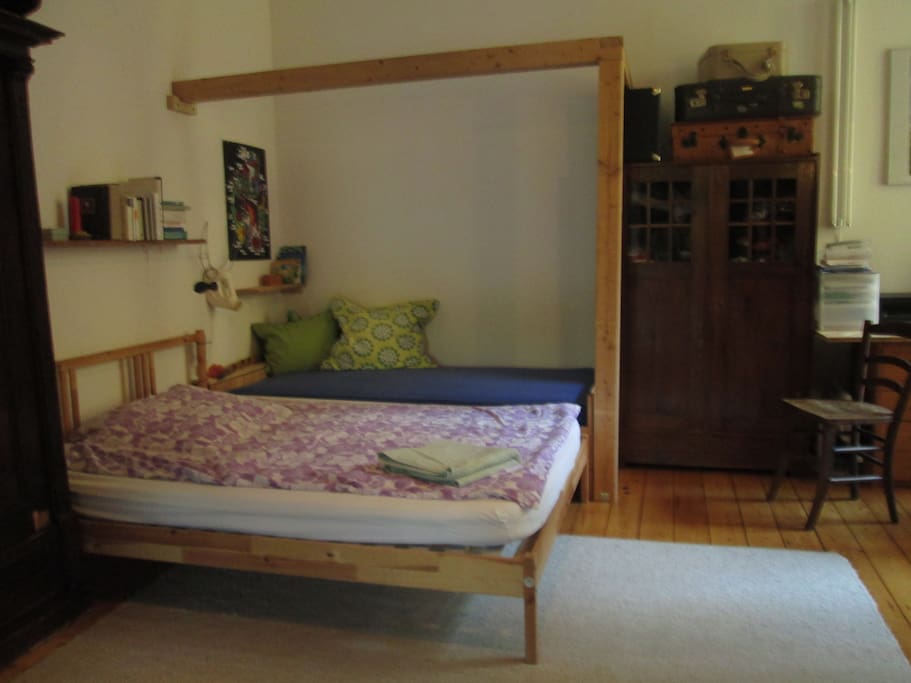 Bedroom with double bed an single bed.