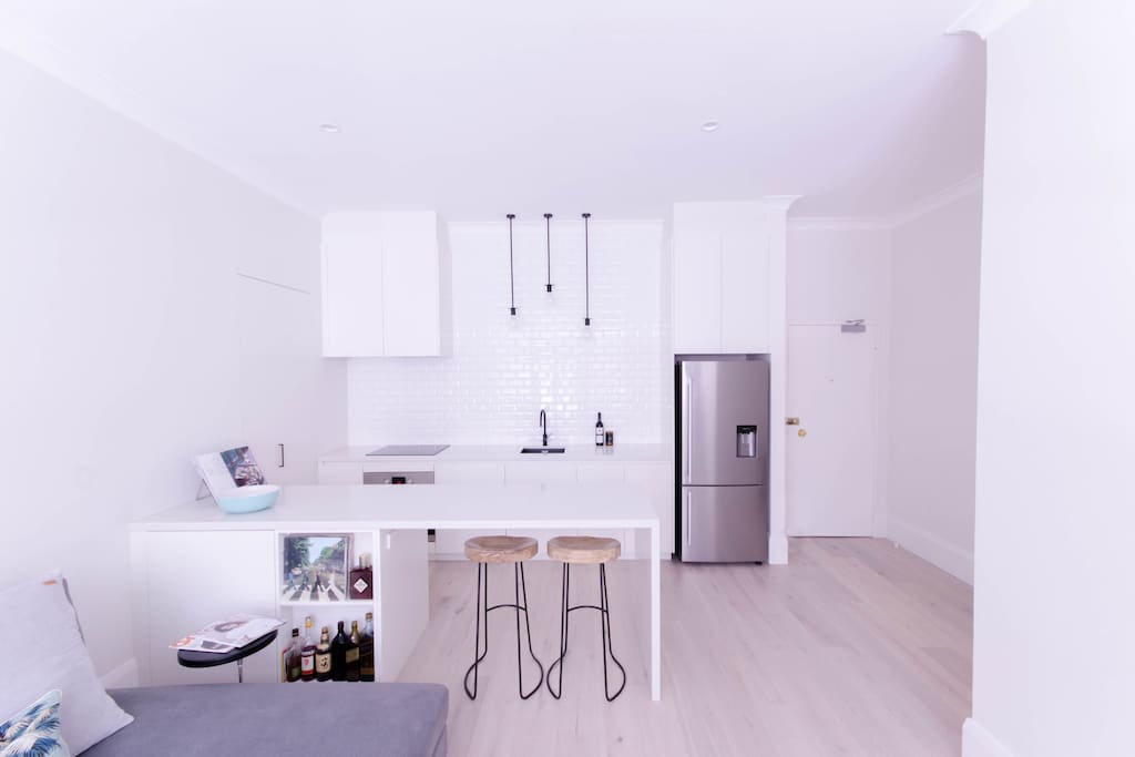 Open plan kitchen with island bench.
