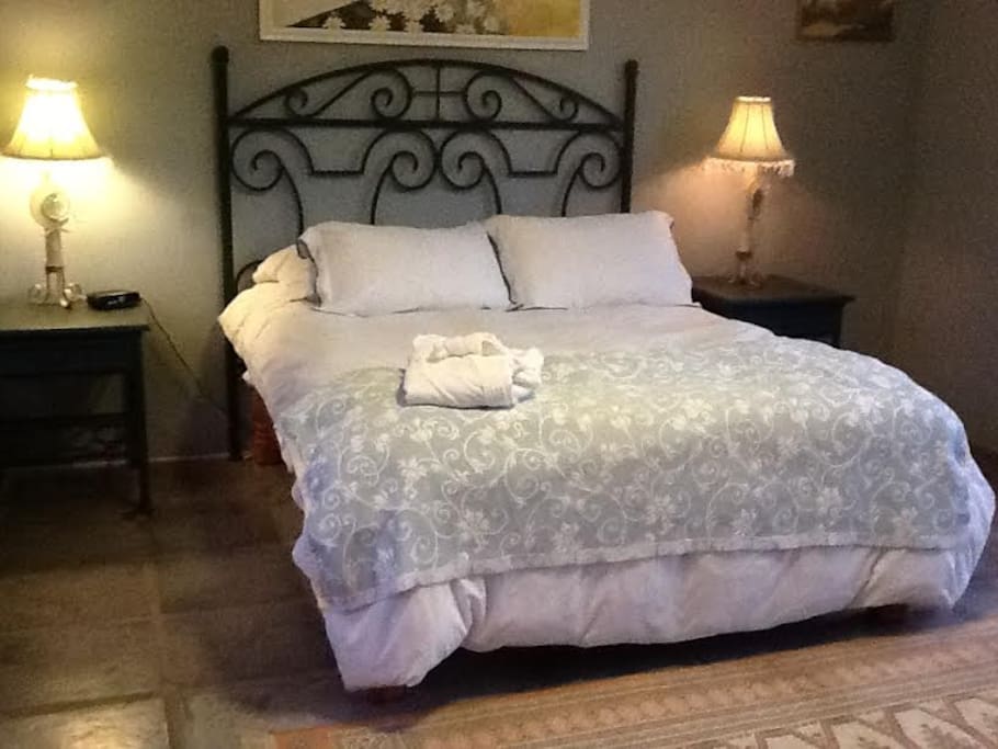 Queen Bed with Down duvets. superb linens.