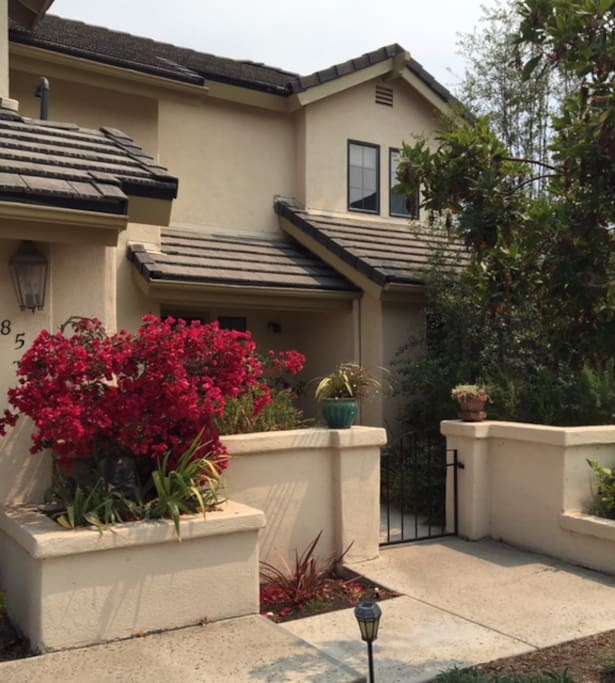 Four-bedroom home in a densely oak-wooded enclave that is private, quiet and a short walk from the Village of Arroyo Grande. 10-minute drive to the beach.