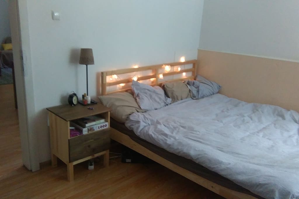 bedroom with double bed and wardrobe