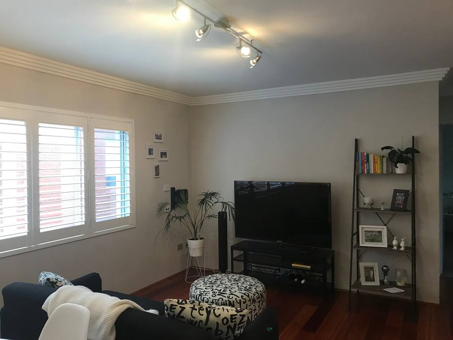 52 inch TV in bright living area