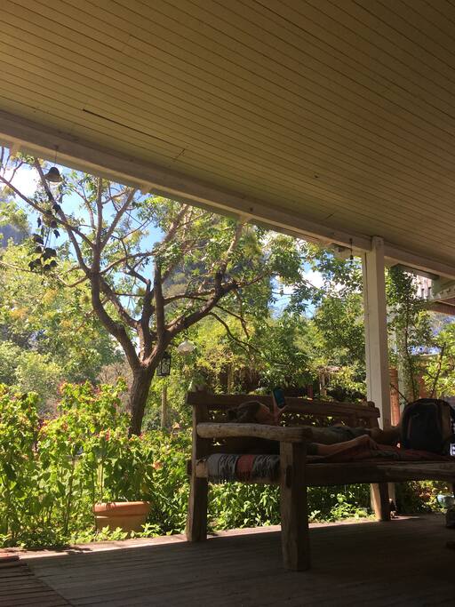 Quiet covered terrace at the back of the house facing the garden