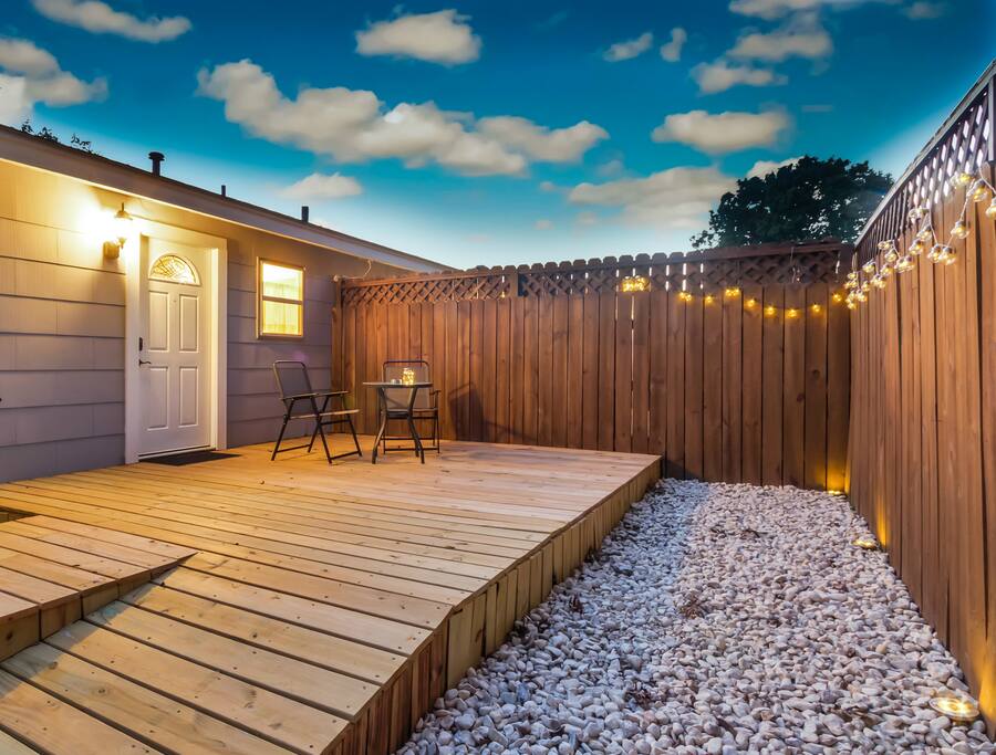 Enjoy a relaxing time in the terrace lit by bistro lights and decorated with river stones.