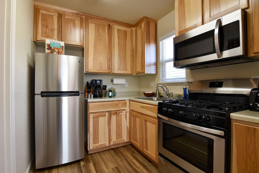 New kitchen with modern appliances.