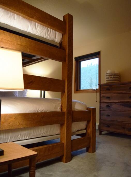 The bunk room is a smart mix of comfort, style, and efficiency.