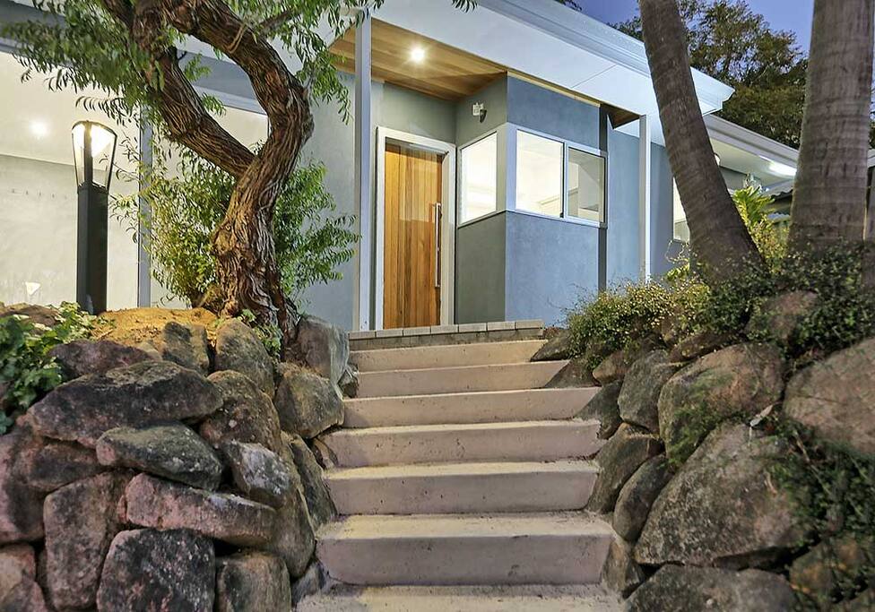 Steps up to the front door of the guesthouse.