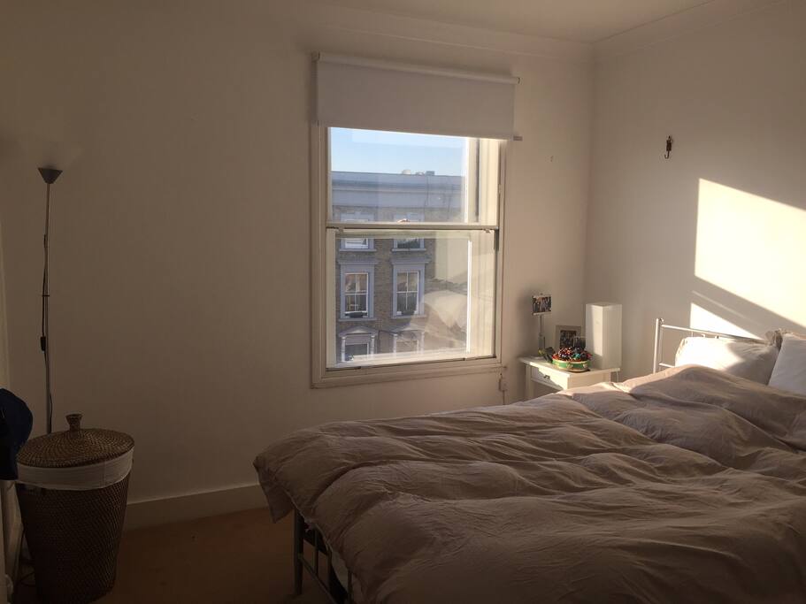 Large bright double bedroom with high ceiling