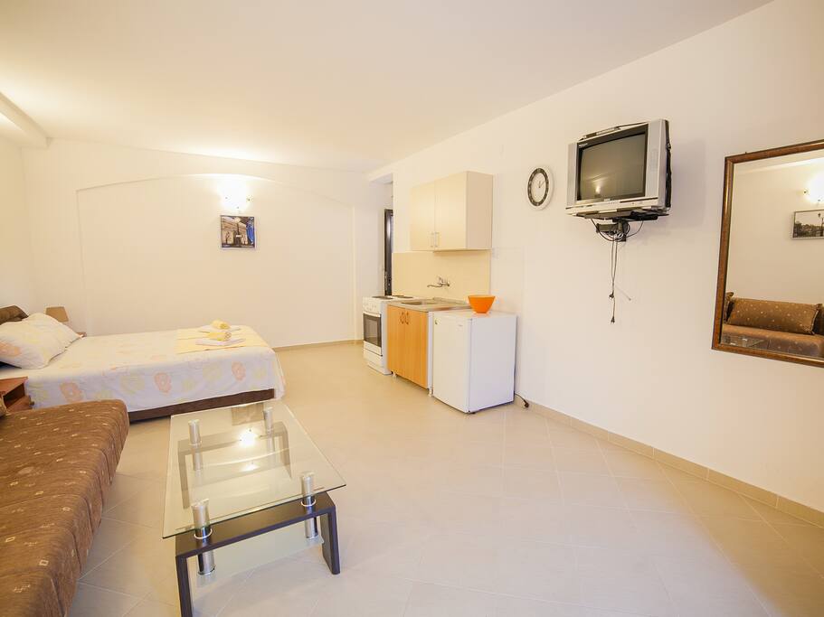 bed and kitchen